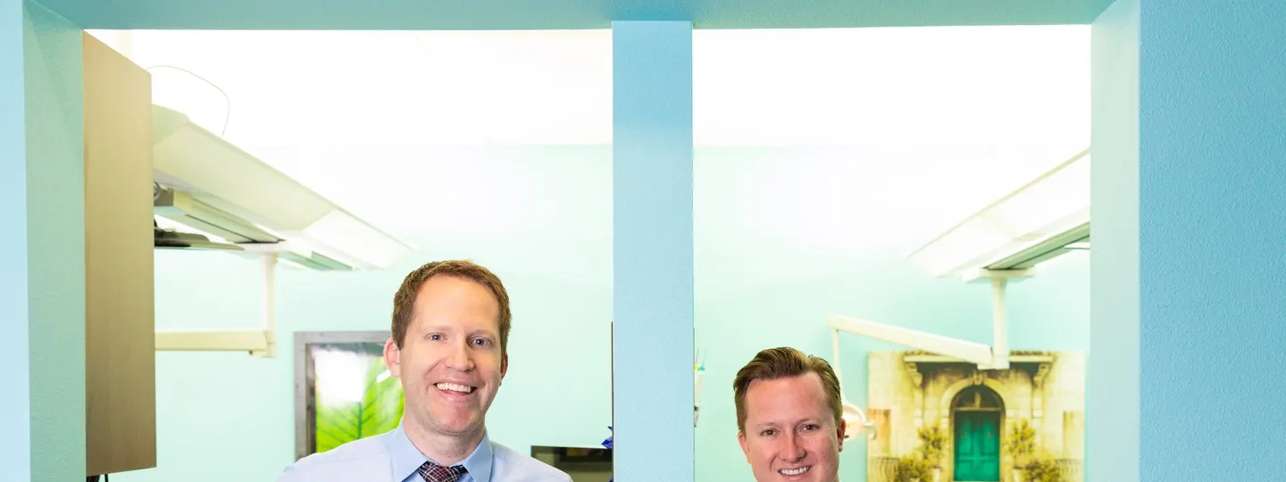 Dr. Rogers and Dr. Mink outside the Desert Ridge Dental treatment rooms