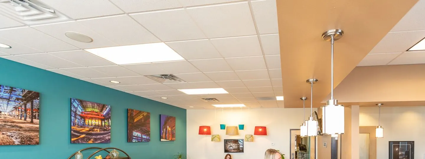 Desert Ridge Dental staff greeting patients in the reception area